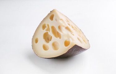 Emmental cheese triangle, Swiss cheese, isolated on white background. High resolution image