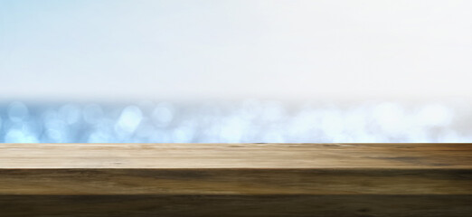beautiful empty rustic wooden table on a day at the beach