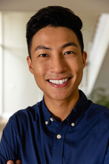 Obraz premium Portrait of happy asian man at home