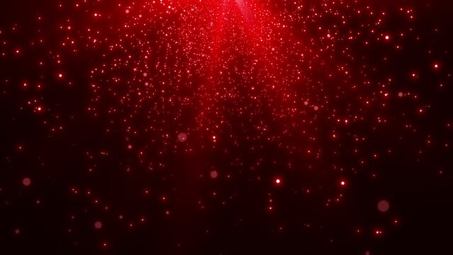 falling red glitter particles background of red light. Seamless loop.
