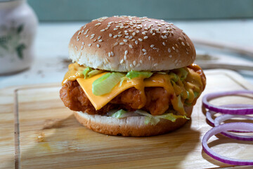 Crispy Cheesy Chicken Patty Zinger Burger with onion rings