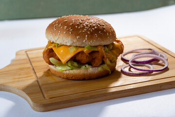 Crispy Cheesy Chicken Patty Zinger Burger with onion rings