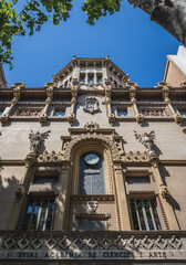 Obraz premium Facade of Royal Academy of Sciences and Arts on La Rambla pedestrian street in Barcelona, Spain