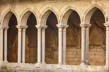 Obraz premium Saint Emilion church cloister columns and arches. Near Bordeaux. France