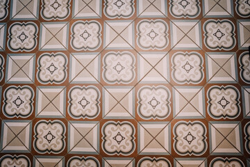 brown patterned tiled floor shot from above