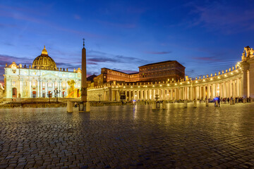 St. Peter's square in Vatican at night, center of Rome, Italy