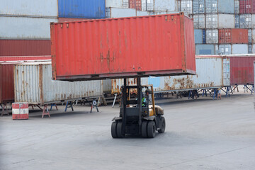 Forklifts lift containers and container warehouses, trade view.