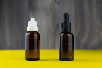 Closeup of CBD oils in brown glass bottles