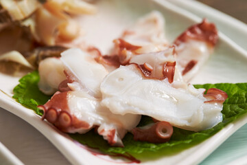 Boiled octopus and conch on a plate
