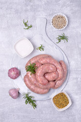 Raw sausages in a natural casing