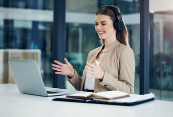 Video call, laptop or happy businesswoman in online meeting or virtual conference for consulting in office. Headphones, explain or girl consultant in webinar communication, talking or conversation