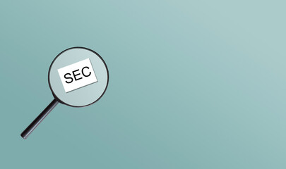 SEC - Securities and Exchange Commission words with magnifying glass