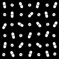 White pills on a black background. Means of treatment of diseases. Prescription from doctor, simple image of pills isolated on black background.