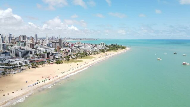 Drone footage showing the Town of Maceio in Alagoas on beach in Brazil in the summer