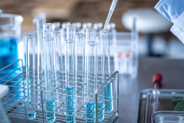Close-up of a scientist's hand doing research in a laboratory