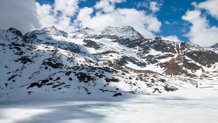 The frozen lake Bianco at the Bernina pass