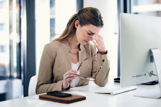 Stress, headache and woman in business, working at computer, desk with pain or corporate office of lawyer. Exhausted, burnout and anxiety in legal, law firm or employee frustrated with mistake