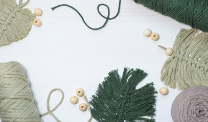 Background with materials for weaving macrame