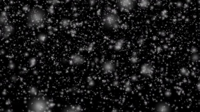 3D rendered animation of heavy snowfall isolated on the empty black background