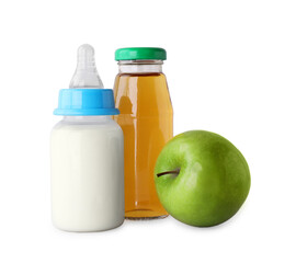 Bottles with juice, milk and ripe apple on light grey background. Baby nutrition