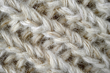 Grey, brown color wool knitted background closeup