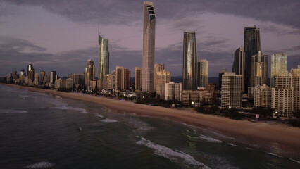 Obraz premium Aerial view of a bustling cityscape with skyscrapers at the shore