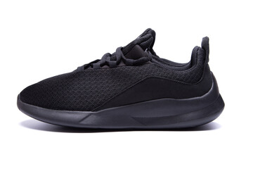 athletic lightweight black sneakers insulated on a white background isolate