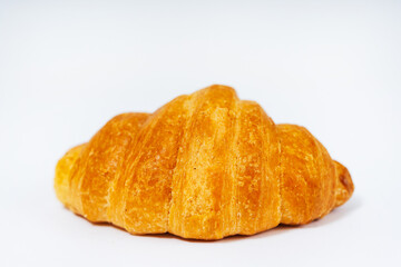 mini croissants for tea on a white background. sweet croissants with filling on a light background. colorful flour pastry