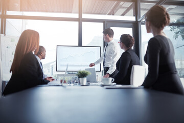 Presentation, proposal and team in a meeting for a report or corporate workshop for sales in a startup company. Board, manager and business man or speaker talking about growth or development strategy