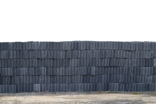 Stack of concrete blocks in construction site isolated on white background included clipping path.