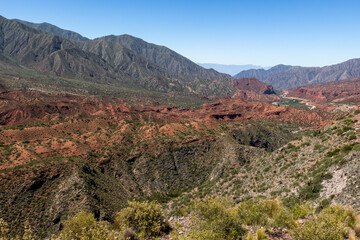 Landscape with reddish rocks along the famous Ruta40 in La Rioja Province, Argentina - traveling South America 