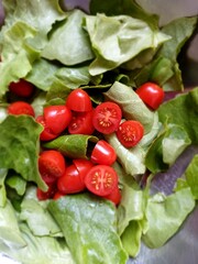 Summer salad, lettuce, cherry tomatoes, olives, feta cheese