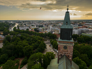 Turku Cathedral, Turun tuomiokirkko at shore of Aura River. Turku, Finland.