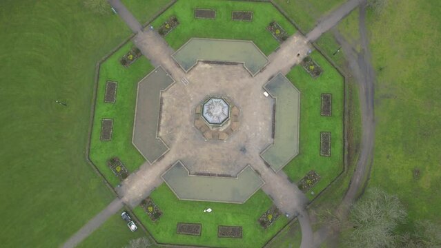 Descending drone footage down on Mannheim water tower at sunset in Mannheim, Germany
