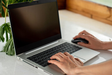 Fototapeta na wymiar women's hands computer keyboard on the table