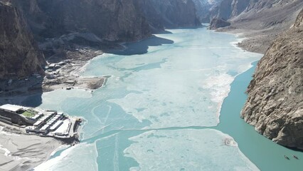Aerial of Attabad lake in Hunza valley, Gilgit Baltistan, Pakistan in winter.