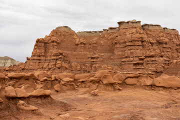 Scenic view on unique eroded sandstone hoodoo rock formations at Goblin Valley State Park, Utah,...
