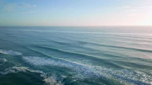 Drone view over foamy waves in Gold Coast, Australia