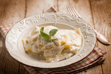 italian ravioli with cheese fresh cream and sage