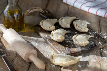 Fototapeta na wymiar Homemade dumplings on a rustic table