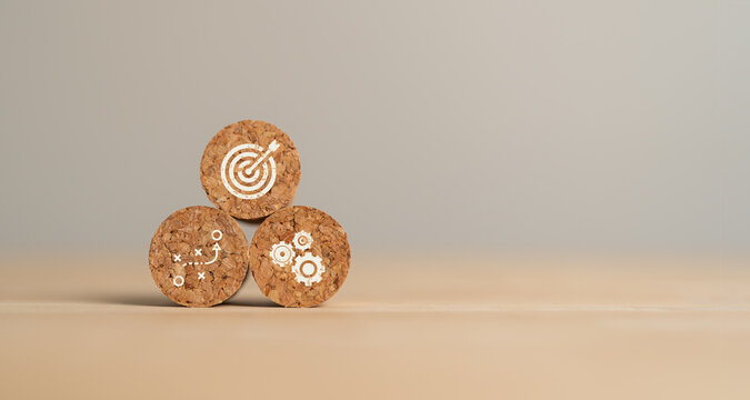 Business Goal, Plan, Action Concept. Round Wood Block With Business Icons; Goal, Game Plan, Process, Action, Execution. Business Strategies And Achieving Goals. Sustainable Development.