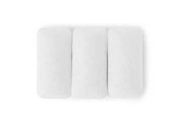Tasty chewing gums on white background, top view