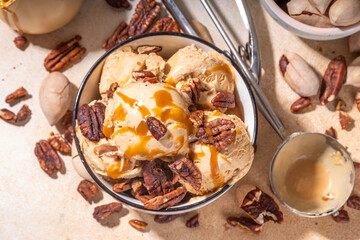 Pecan pie ice cream bowl. Traditional autumn spicy pecan caramel pie gelato taste, with rich...