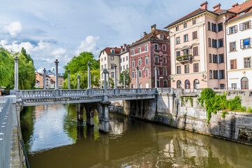 A view up the River Ljubljanica towards the Shoemakers bridge in Ljubljana, Slovenia in summertime