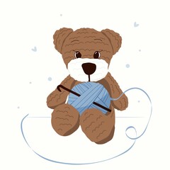 amigurumi teddy bear with a knitting yarn 