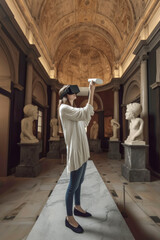 Fototapeta na wymiar Generative AI illustration of Museum employee with virtual reality headset in a museum