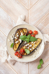 Baked eggplant with tomatoes, garlic and paprika