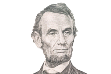 Portrait of US president Abraham Lincoln. Face Lincoln on USA 5 dollar bill closeup isolated. America money