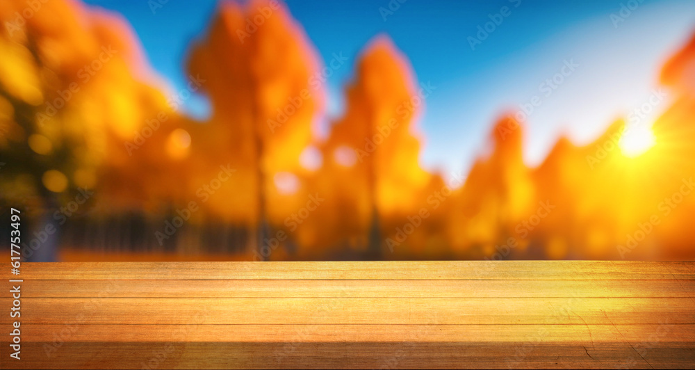Aufkleber wooden planks against the background blurred of trees in a beautiful autumn park. autumn background 