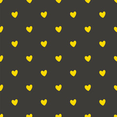 Hearts seamless pattern. Cute Hand-drawn nursery cartoon doodle. Childish vector illustration, simple naive style. Yellow shapes on a black background. Perfect for printing fabrics, packaging, clothes